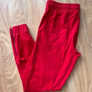 Zyia Red Everywhere Zipper Joggers. Size Medium.